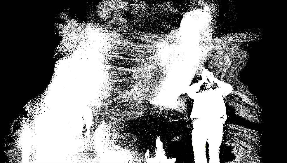 Abstract black and white artistic image with a faint human figure on the right side appearing to hold something near their face.